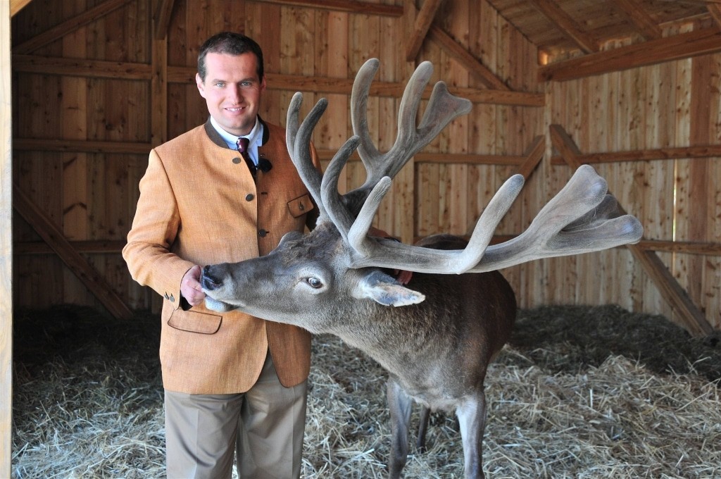 Dieter Ehrengruber with Burli the stag
